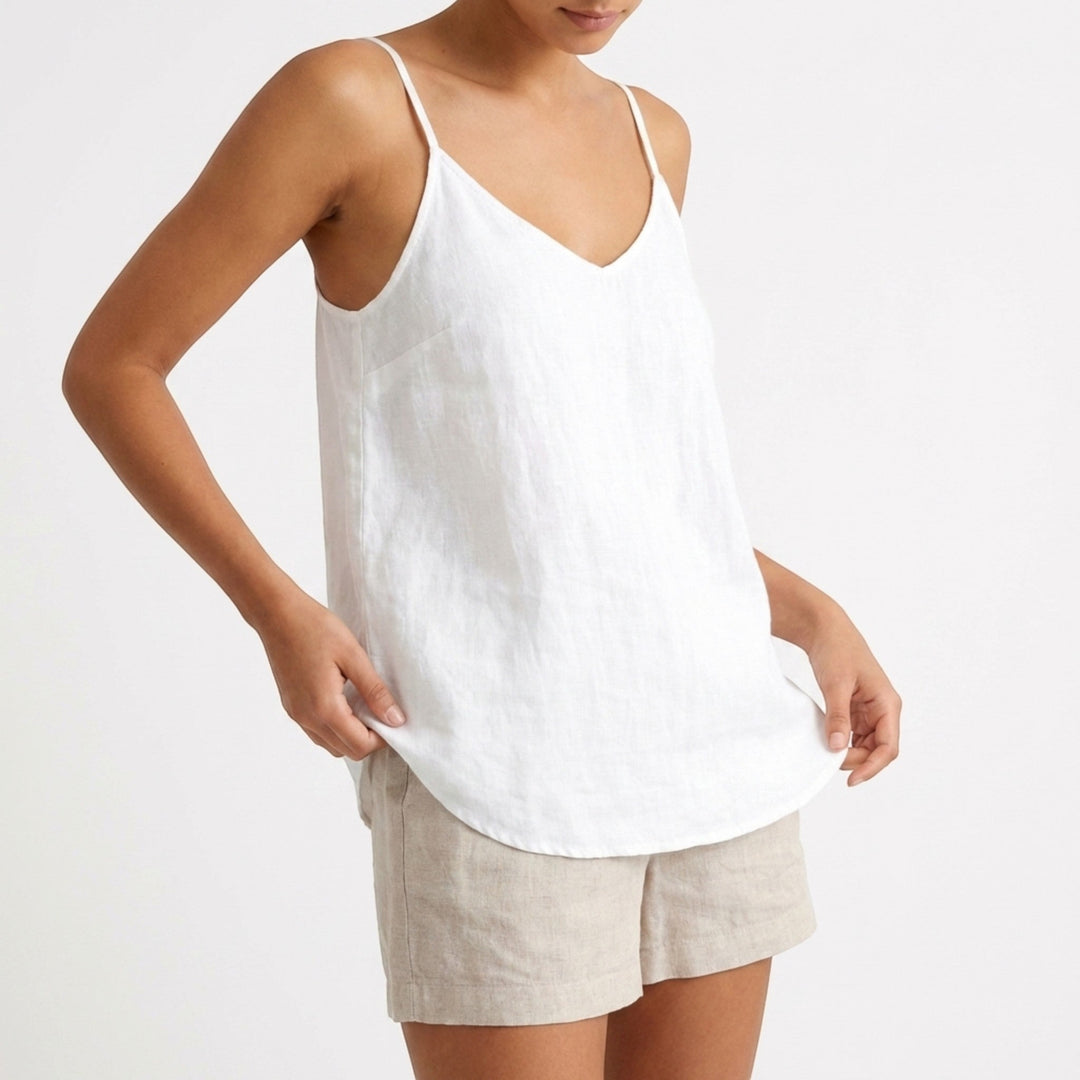 Casual women's spaghetti strap tank top with a relaxed fit, ideal for summer and layering.