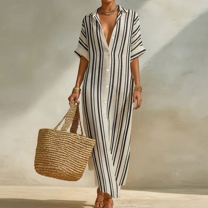 Women's relaxed fit striped long shirt dress with three-quarter sleeves, perfect for casual summer days.