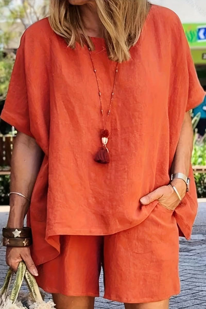 Stylish women's summer leisurewear set. Solid color relaxed shorts & matching top, ideal for a warm weather outfit.