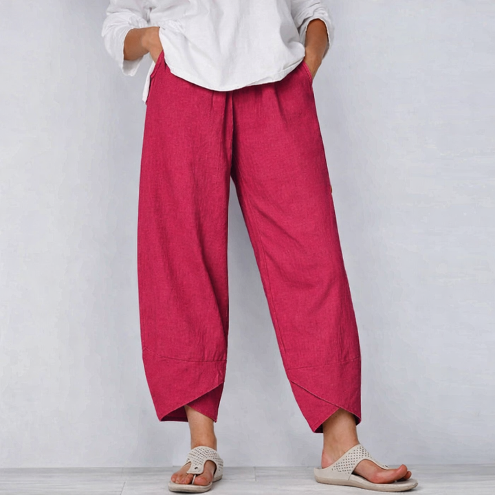 Model wearing versatile women's relaxed fit summer trousers, showcasing comfortable casual style.