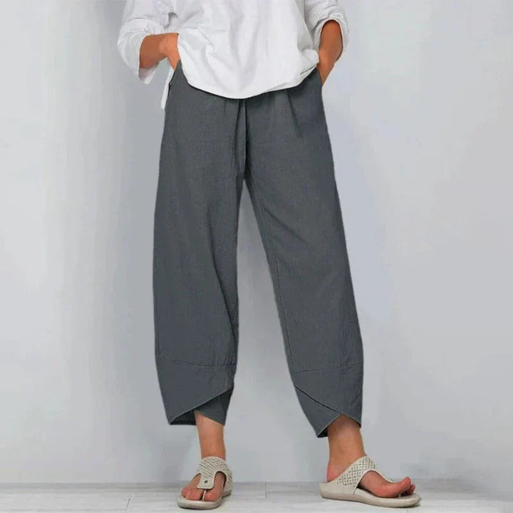 Side view of women's tapered leg summer trousers, highlighting their relaxed fit and chic style for spring.