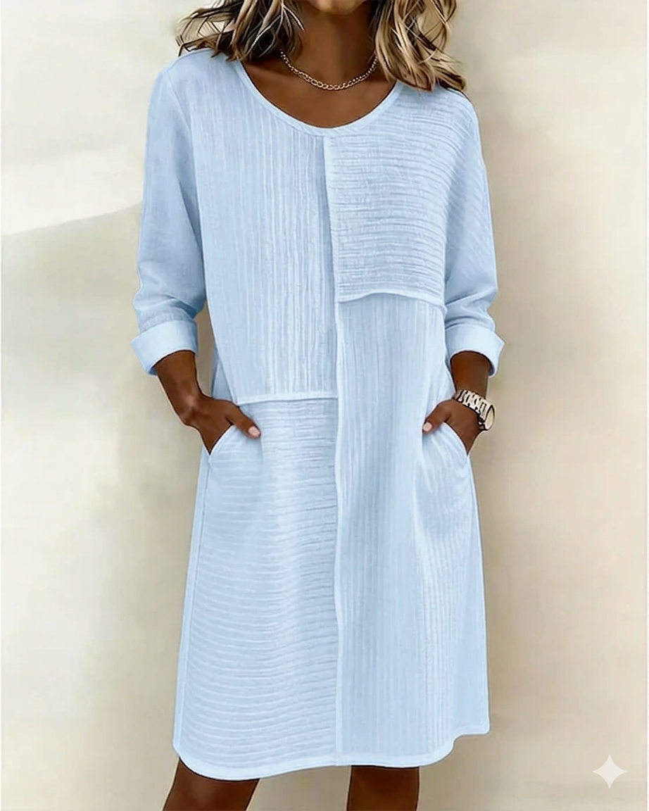 Women's Relaxed Fit Textured Shift Dress with Pockets. A comfortable 3/4 sleeve casual summer fashion piece.