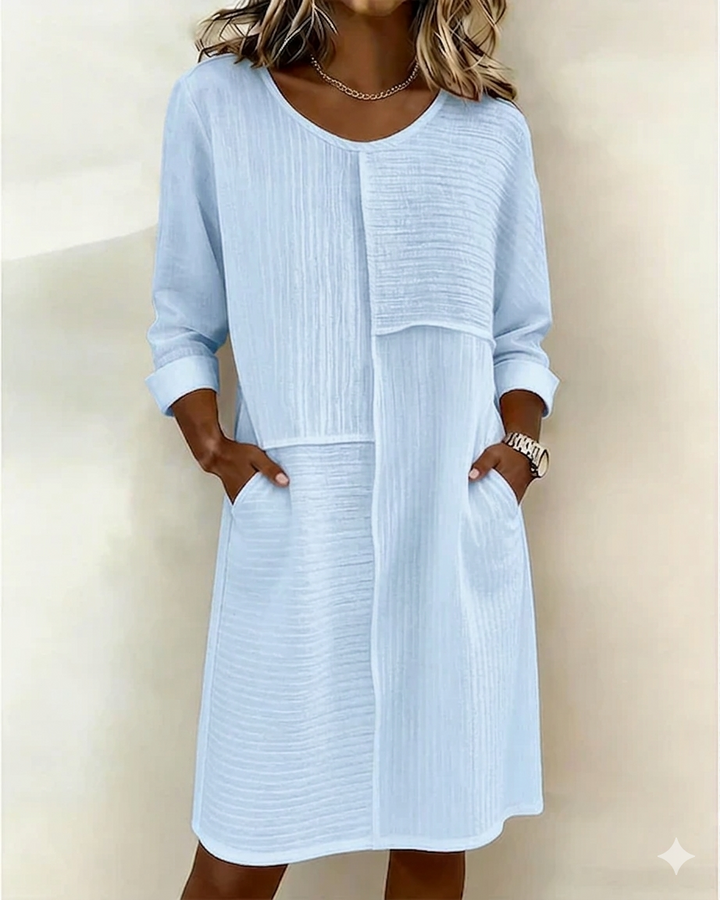 Women's Relaxed Fit Textured Shift Dress with Pockets. A comfortable 3/4 sleeve casual summer fashion piece.