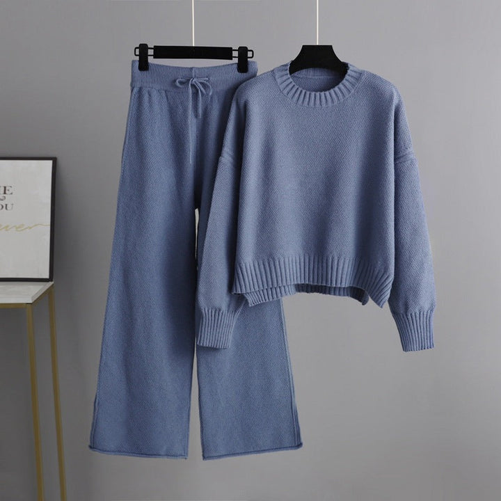 Soft women's relaxed fit two-piece lounge set. Includes a stylish cropped top and comfy wide leg pants.