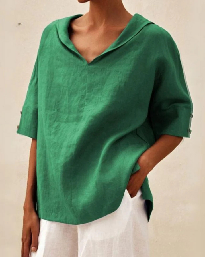 Women's relaxed fit V-neck short sleeve blouse, comfort top for casual and everyday summer wear.