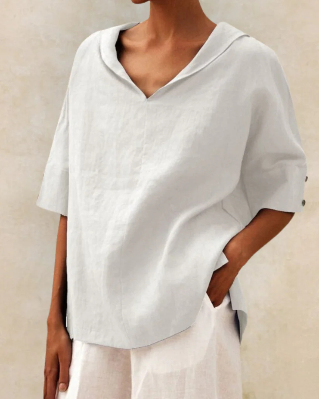 Comfortable women's relaxed V-neck short sleeve blouse, versatile for daily wear, perfect as a summer fashion top.