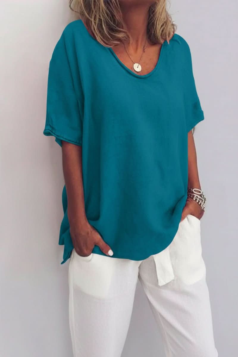 Women's versatile V-neck summer blouse, relaxed fit and lightweight, ideal for effortless warm weather fashion.