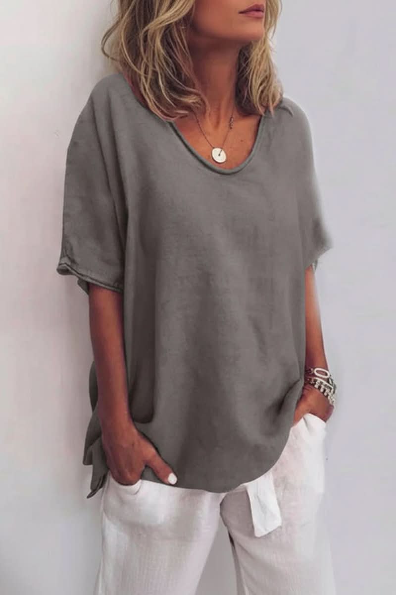 Chic women's relaxed fit summer top, with a V-neck and lightweight design for versatile everyday wear.