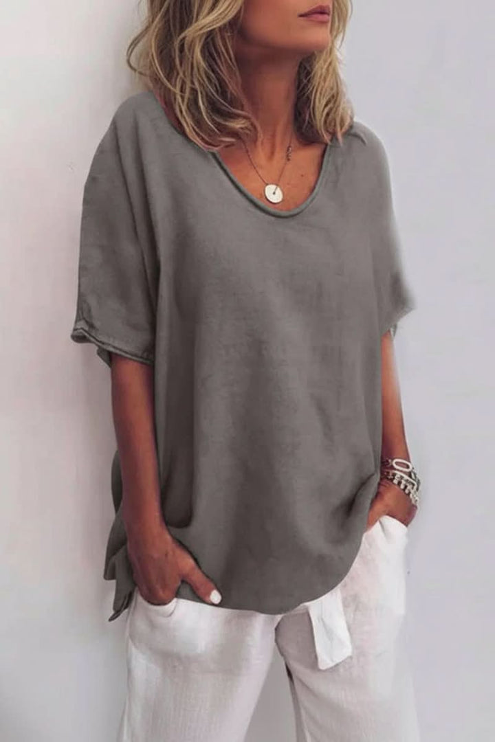 Chic women's relaxed fit summer top, with a V-neck and lightweight design for versatile everyday wear.