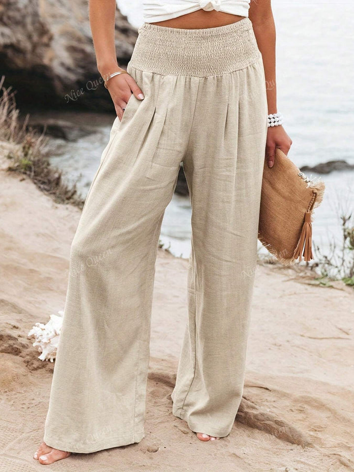 Women's relaxed fit wide leg pants, perfect for comfortable summer style. Flowy and chic everyday trousers.