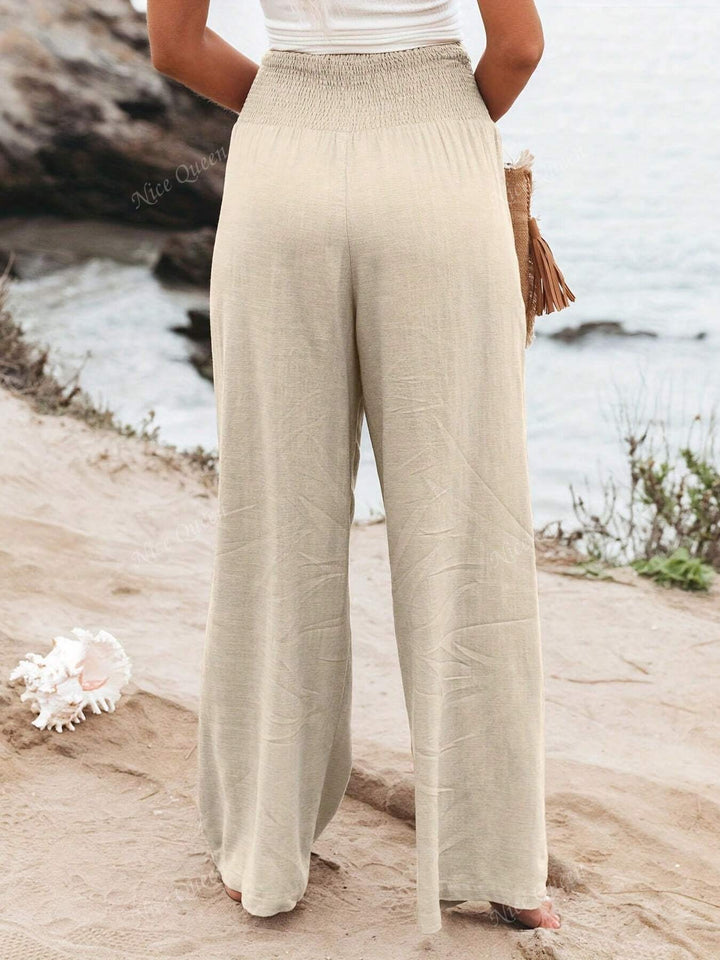 Lightweight women's wide leg pants in a relaxed fit, ideal for summer comfort. Versatile and stylish.