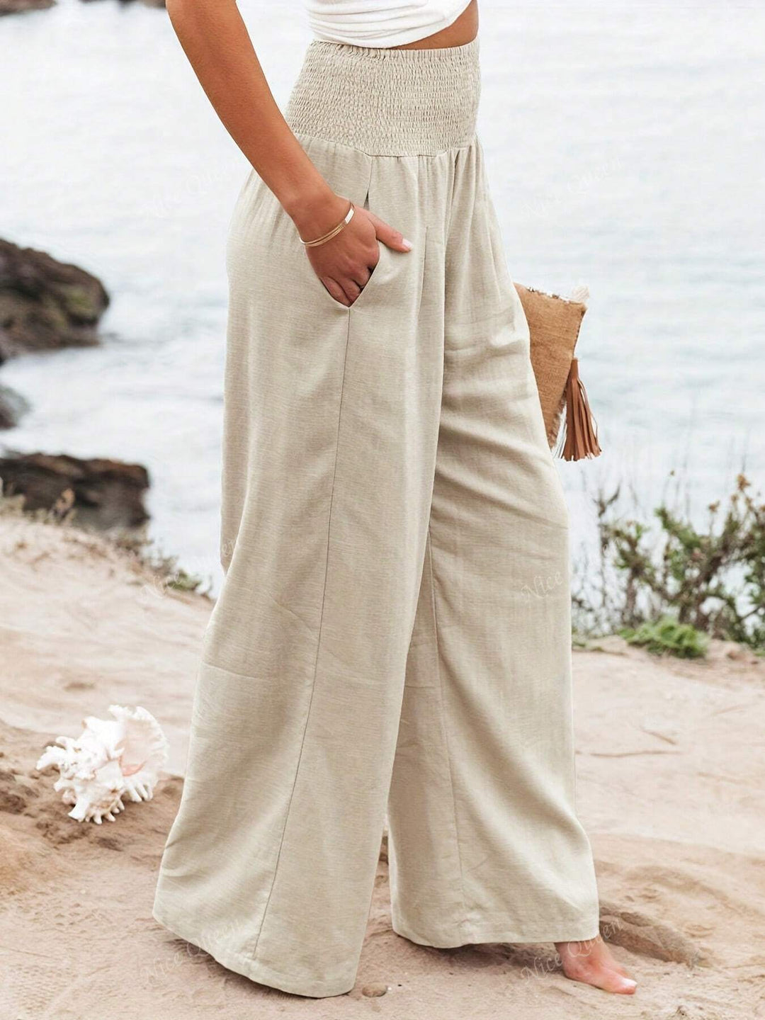 Casual women's wide leg pants with a relaxed fit, designed for breathable summer comfort & everyday wear.