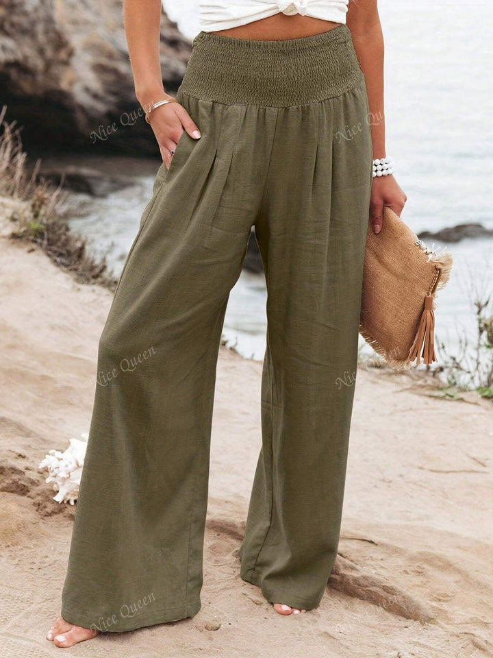 Model wearing women's flowy wide leg pants, showcasing a comfortable and chic summer style.