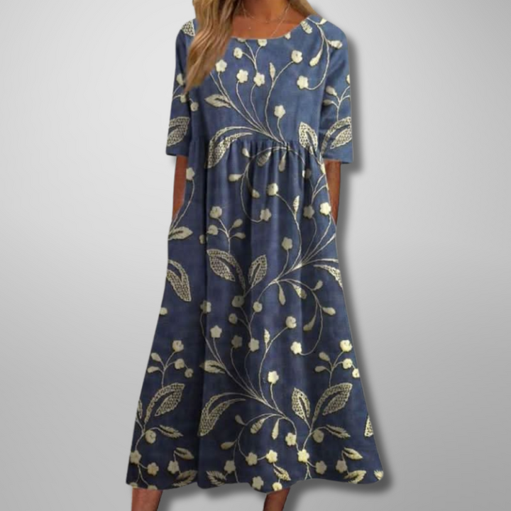 Women's relaxed floral midi dress, perfect for effortless spring & summer style.