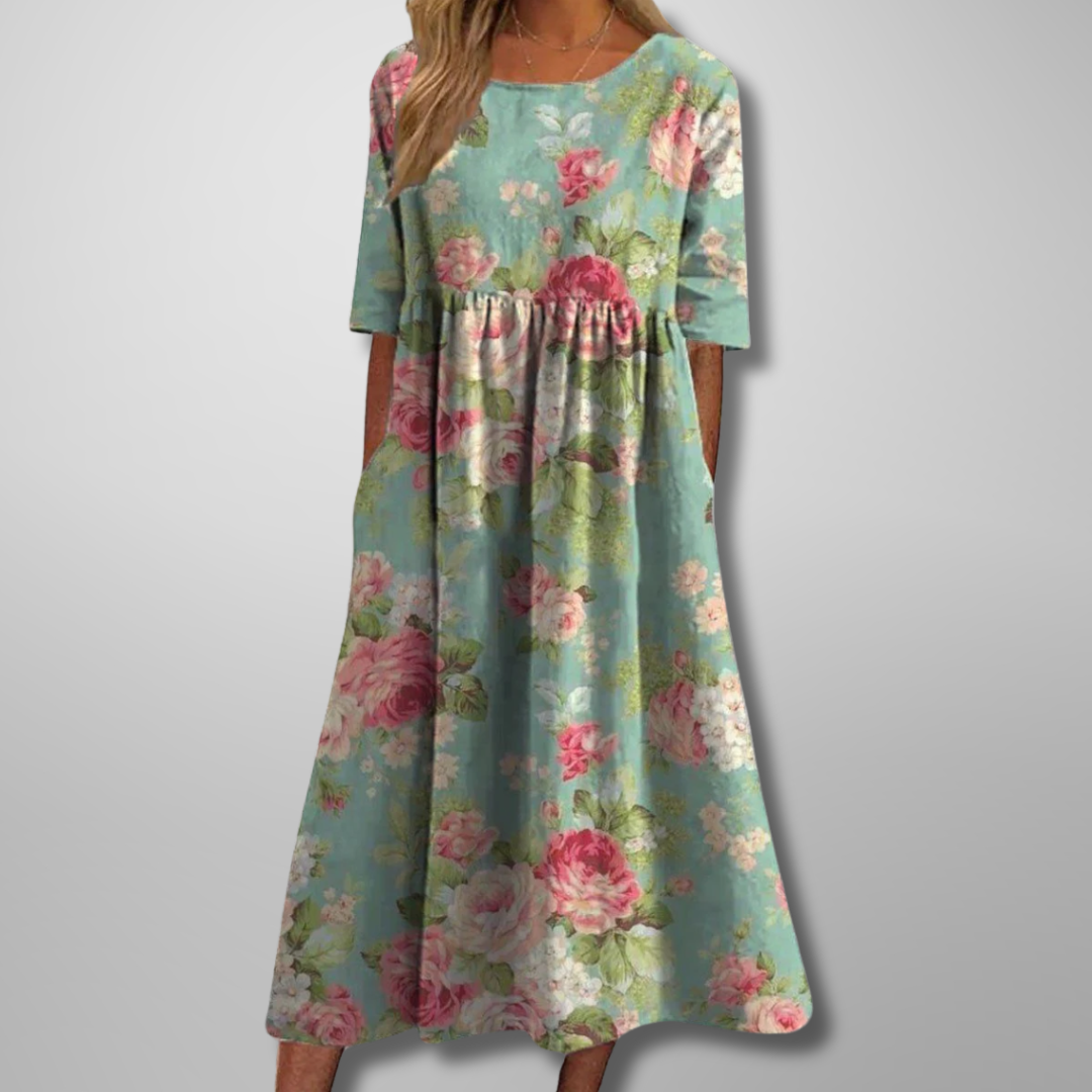 Flowy, relaxed fit women's floral midi dress for comfortable, casual everyday wear.