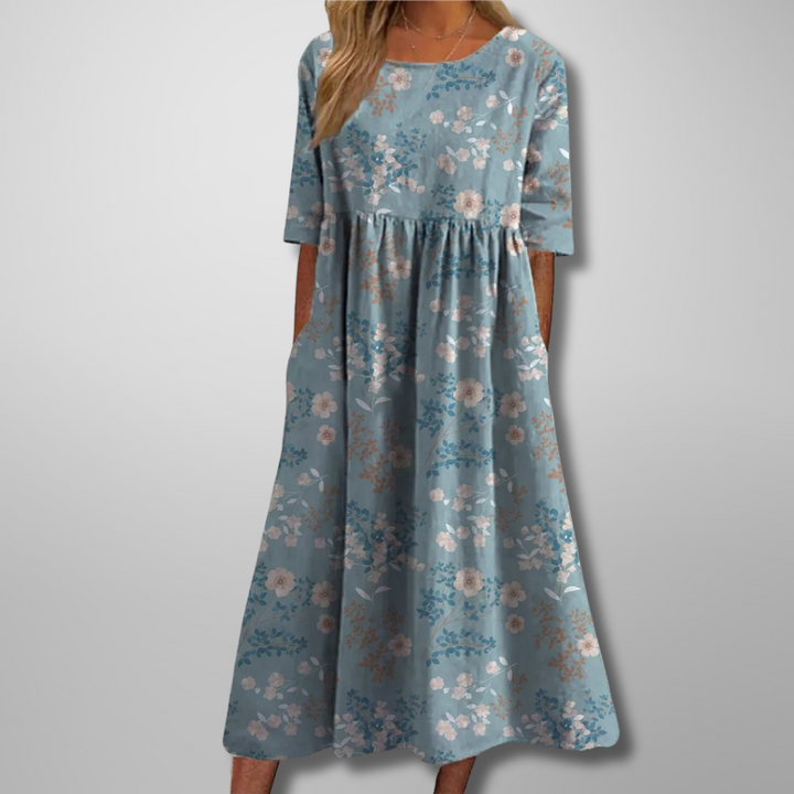 Soft, comfortable women's relaxed floral midi dress, perfect for warm weather and style.