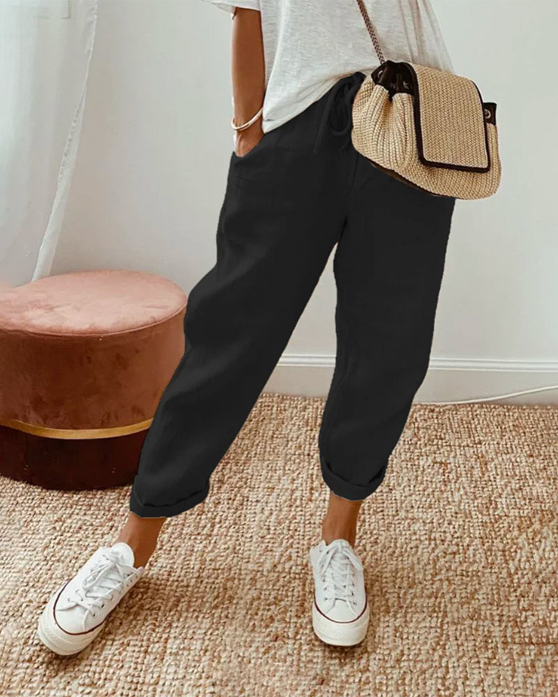 Comfortable women's linen jogger pants. Relaxed fit, drawstring waist & roll cuff. Ideal casual summer trousers.