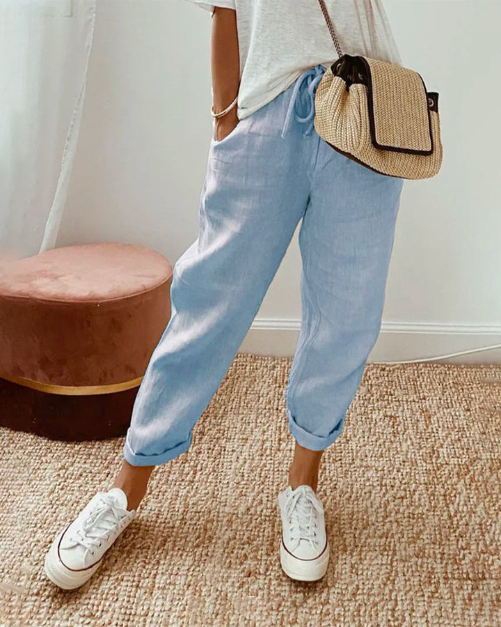 Lightweight women's relaxed linen jogger pants. Features comfy drawstring waist, stylish roll cuff. Great for summer.