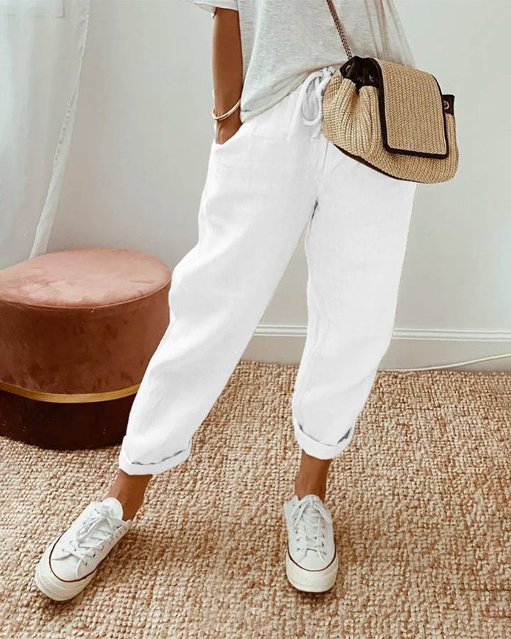 Women's casual linen jogger pants for summer. Relaxed fit, drawstring, roll cuff. Comfortable & stylish warm-weather wear.
