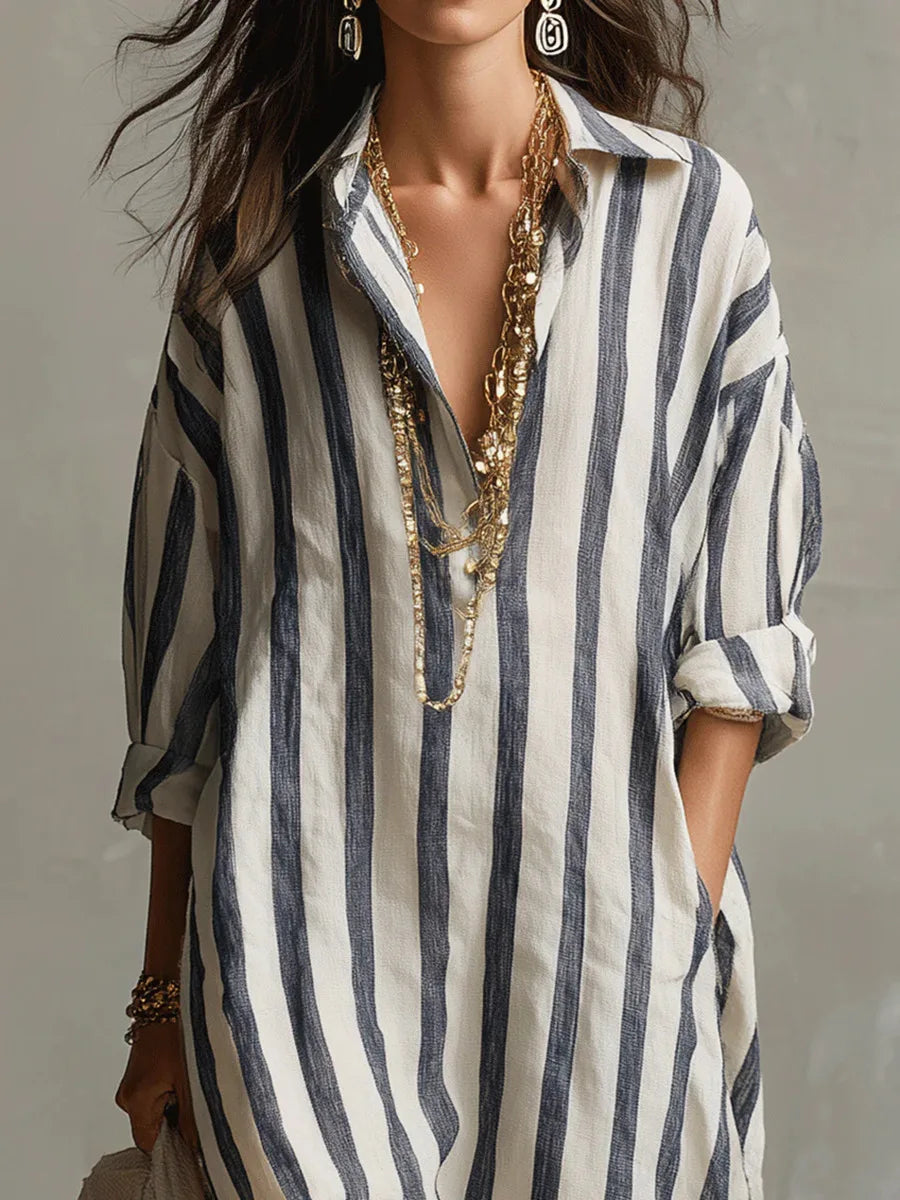 Versatile women's long shirt dress. Relaxed fit, V-neck, three-quarter sleeve, perfect as a beach, day, or casual dress.