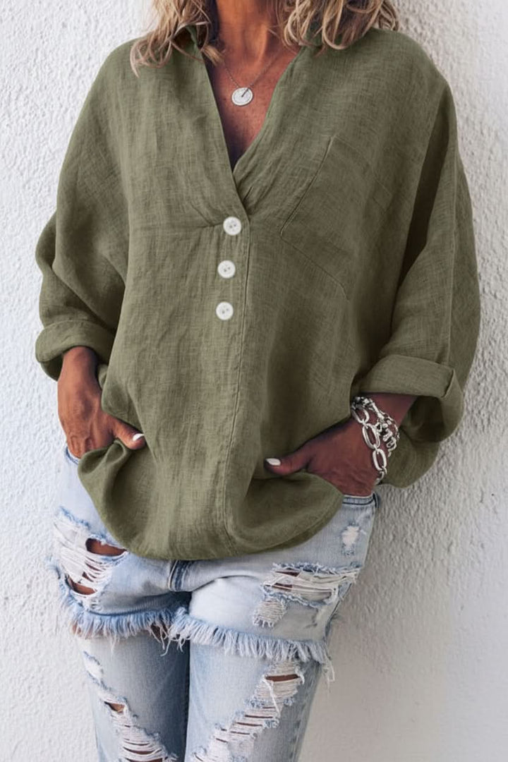 Comfortable & chic women's relaxed fit blouse. Features a stylish open back, great for warm weather & everyday wear.
