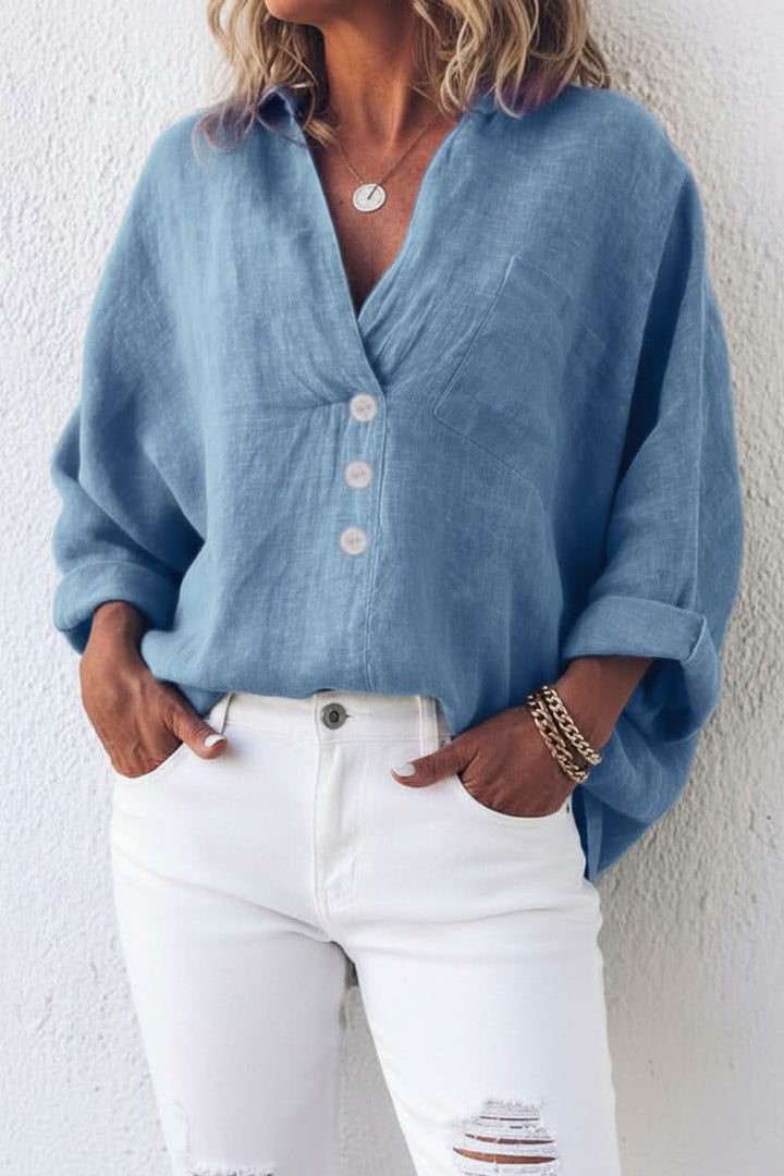 Modern design women's top with an elegant open back. Relaxed fit blouse, a versatile shirt for stylish comfort.