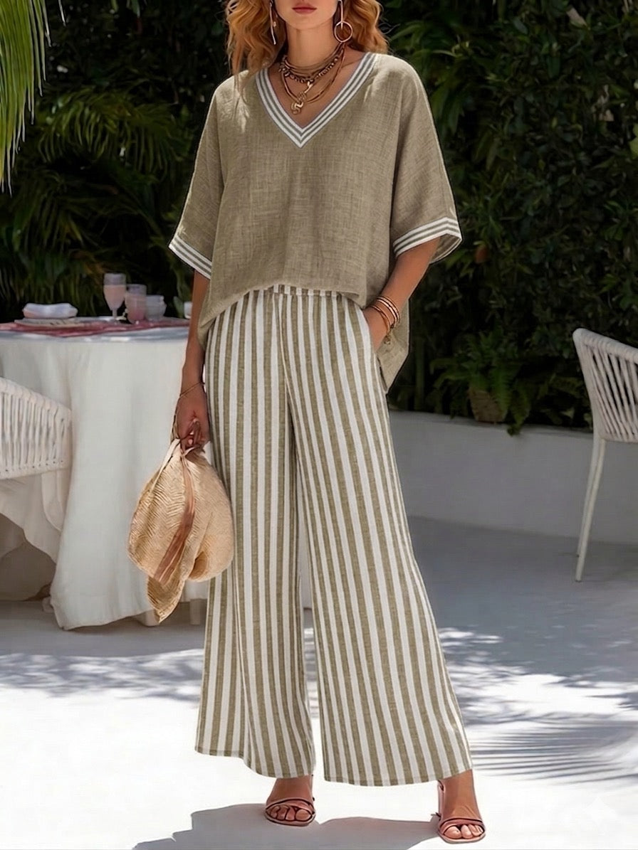 Women's striped shirt & wide-leg pant set. Relaxed fit two-piece for comfortable, stylish casual wear.