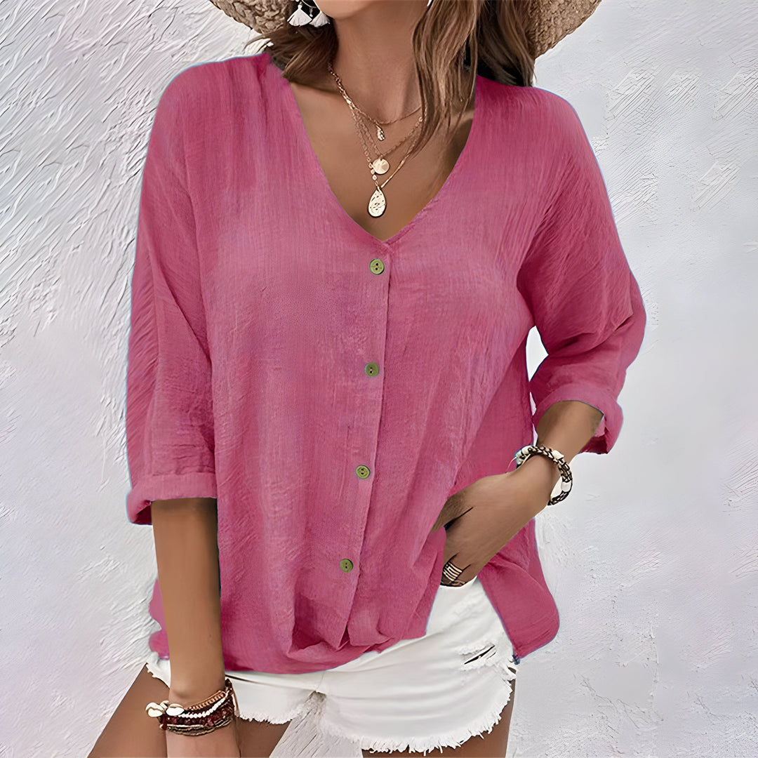 Everyday women's relaxed V-neck roll sleeve button blouse. A versatile, casual summer top for ladies.