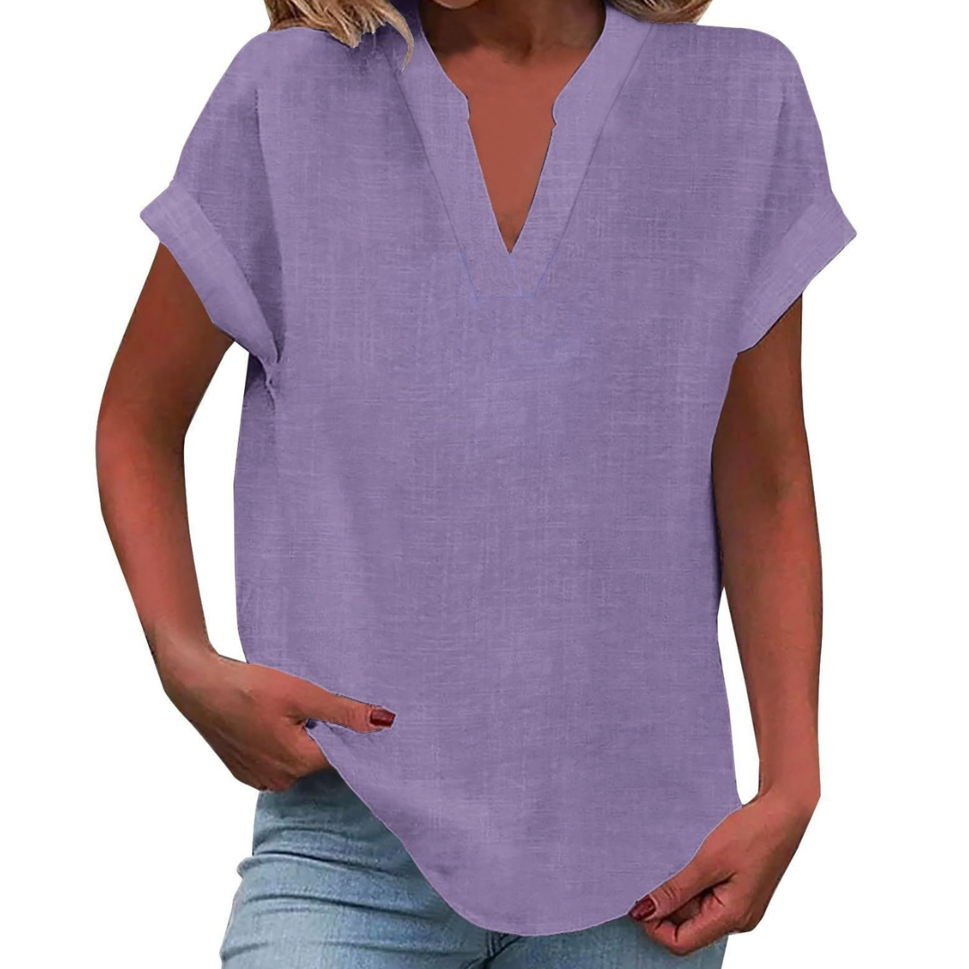 Women's relaxed V-neck summer blouse, loose fit, short sleeve, perfect for casual everyday style.