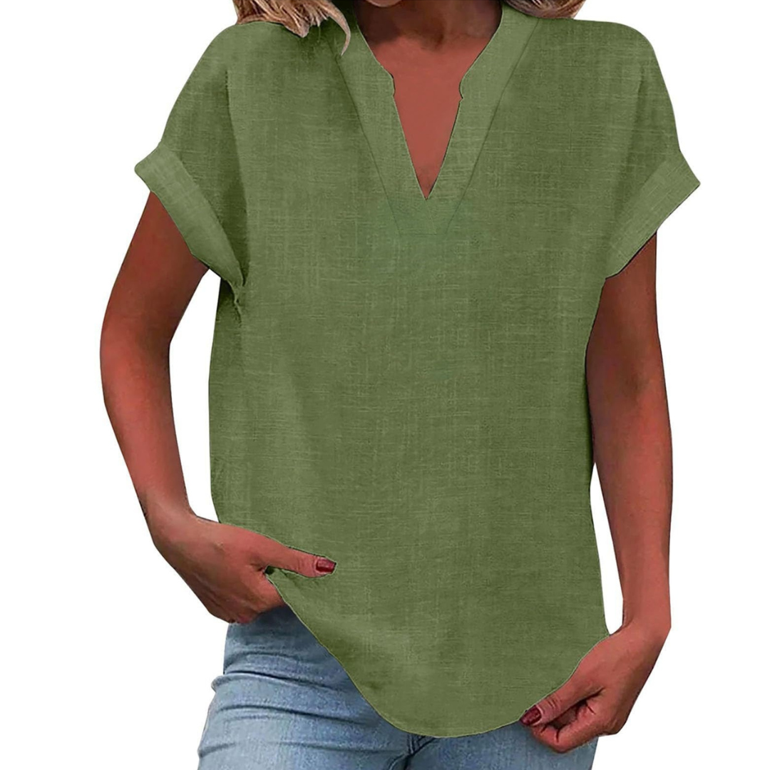 Cool summer V-neck blouse for women, offering a relaxed, loose fit & short sleeves for comfort.