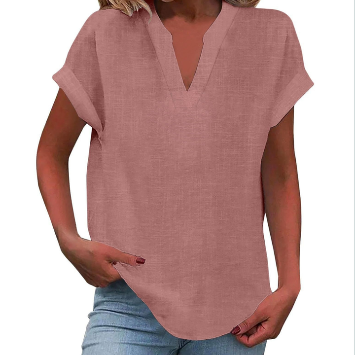 Comfortable women's V-neck blouse, relaxed fit, ideal for summer fashion & effortless style.