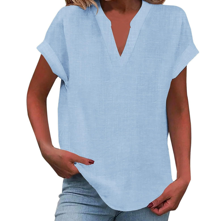 Versatile women's V-neck top with a relaxed, loose fit for comfortable casual wear this summer.