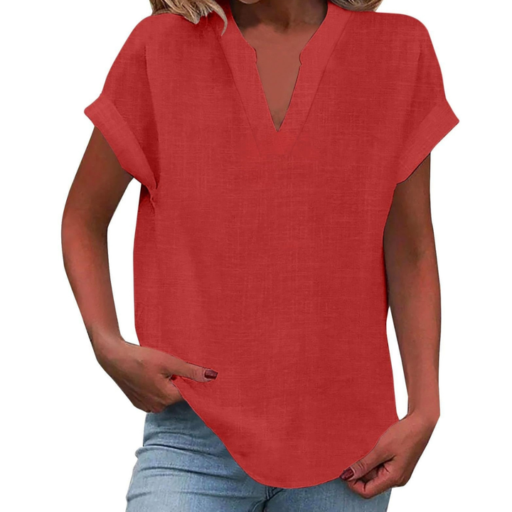 Plus size women's relaxed fit V-neck blouse, comfortable & stylish for summer fashion.