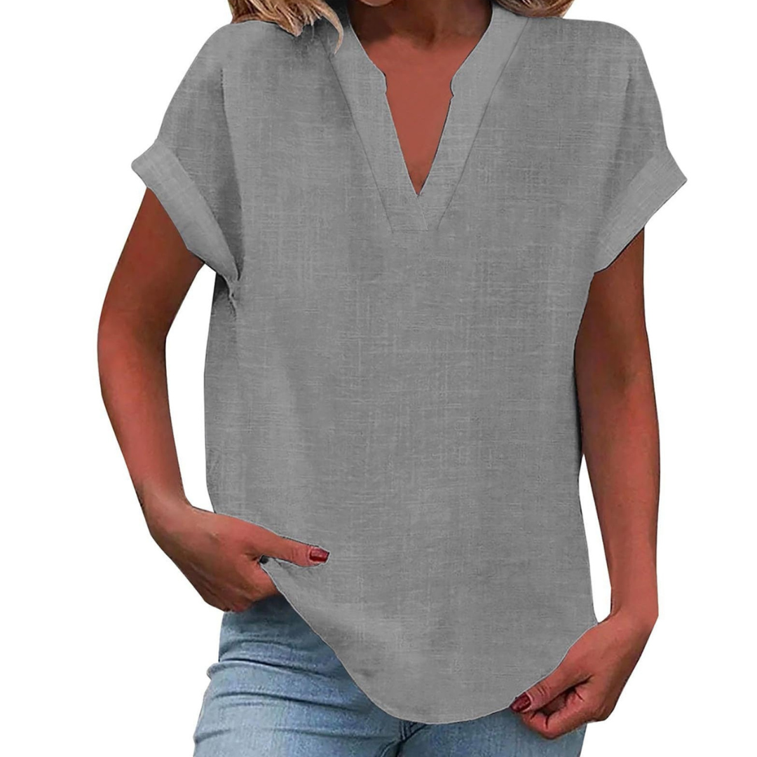 Lightweight V-neck summer blouse for women, featuring a relaxed fit & short sleeves.