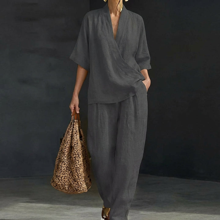 Versatile women's fashion set: relaxed v-neck top and wide-leg pants. Perfect for casual comfort & travel.