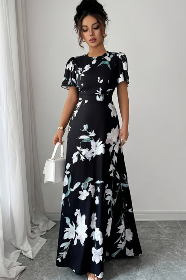 Women's retro pleated floral midi dress, elegant for summer and spring fashion.