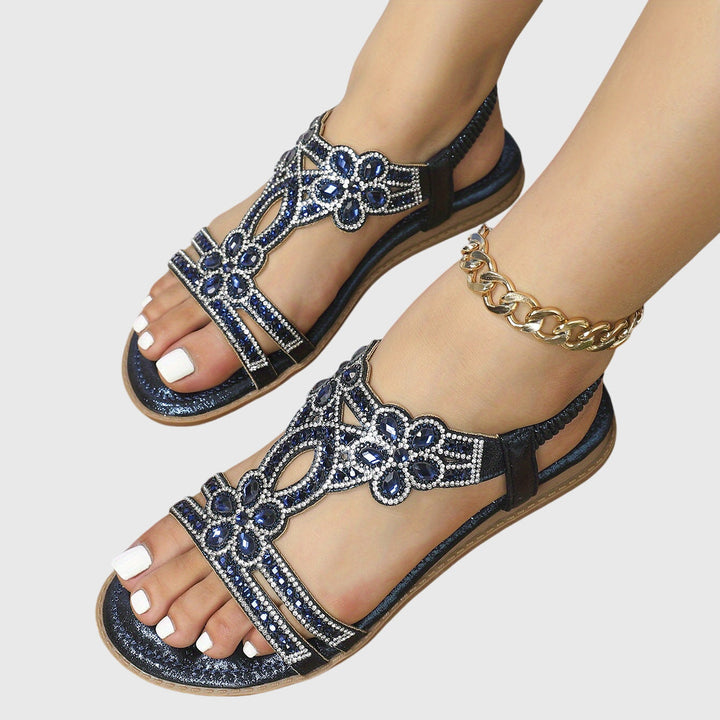 Women's flat sandals with rhinestone straps & floral details, boho chic.