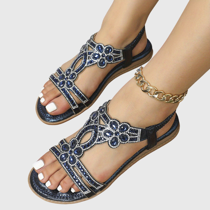 Comfortable women's summer sandals, adorned with glamorous rhinestone embellishments.