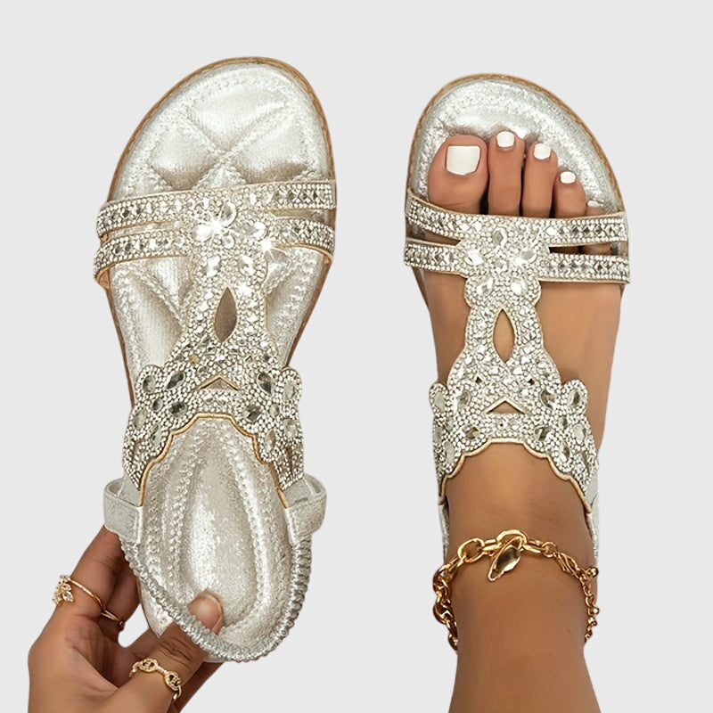 Stylish women's rhinestone embellished flat sandals for ultimate comfort.