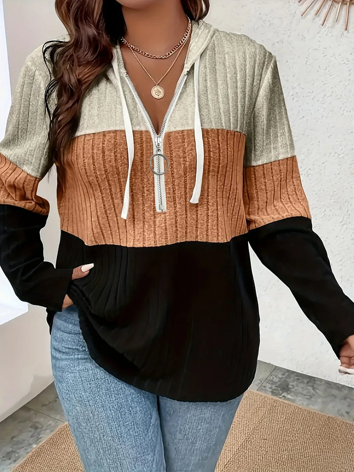 Fashionable women's ribbed knit hoodie with color block detailing, relaxed fit