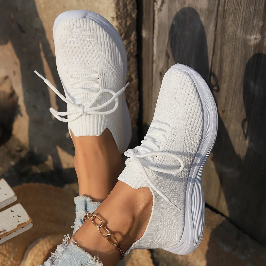 Stylish women's ribbed sock lace-up sneakers, minimalist design for all-day comfort & versatility.