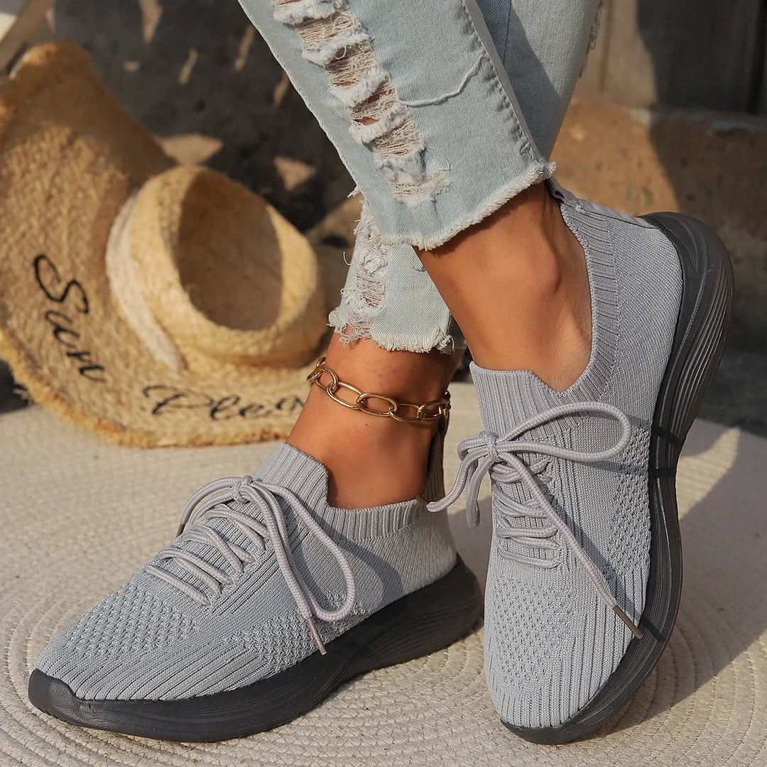 Fashionable women's ribbed sock sneakers, lace-up design with a durable rubber sole for comfort.