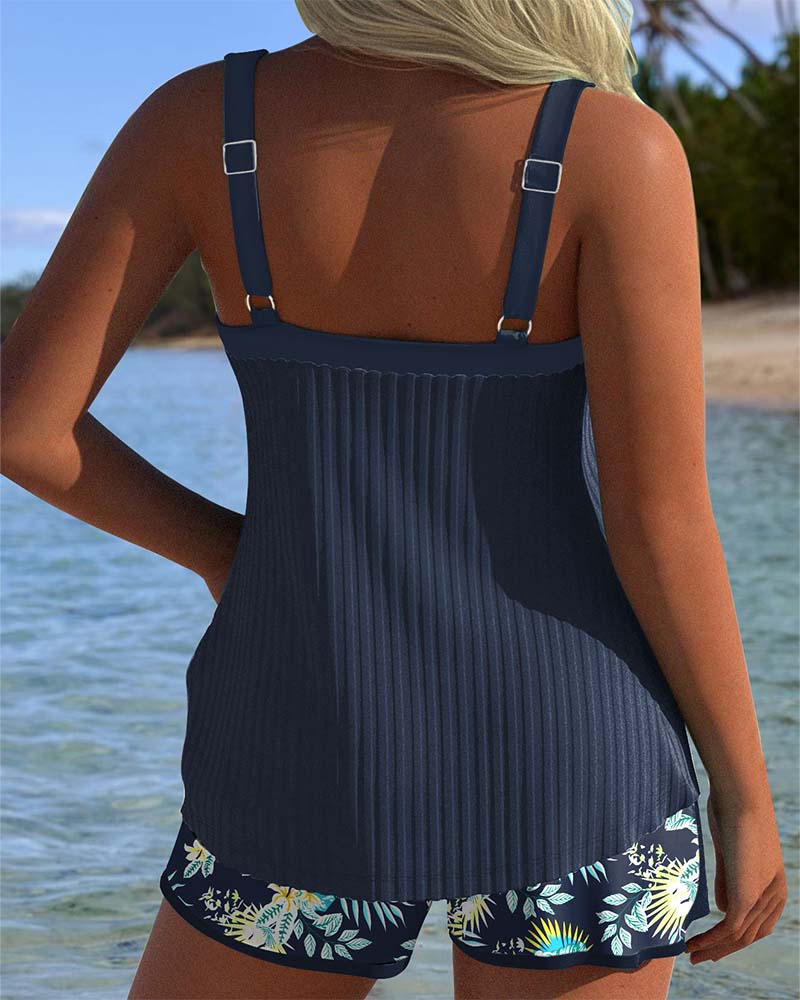 Ribbed tie-front sweetheart tankini top, paired with tropical print shorts. Womens modest swimsuit for resort wear.