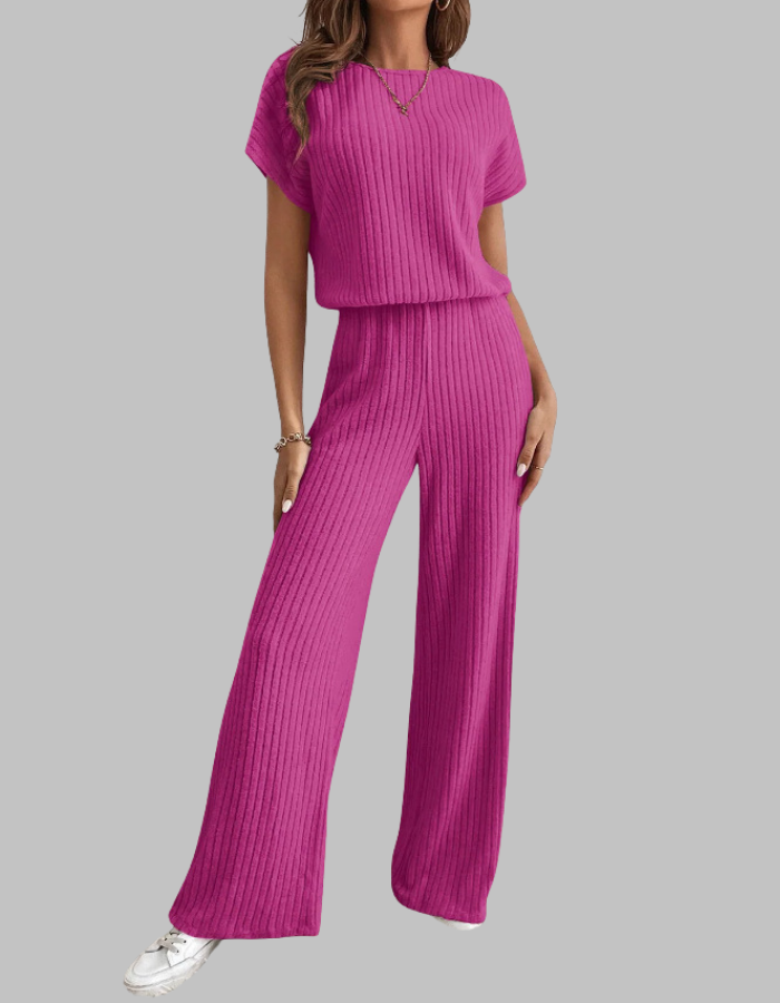 Soft ribbed women's two-piece set, featuring a comfy short sleeve top and relaxed wide-leg pants. Perfect for lounge.