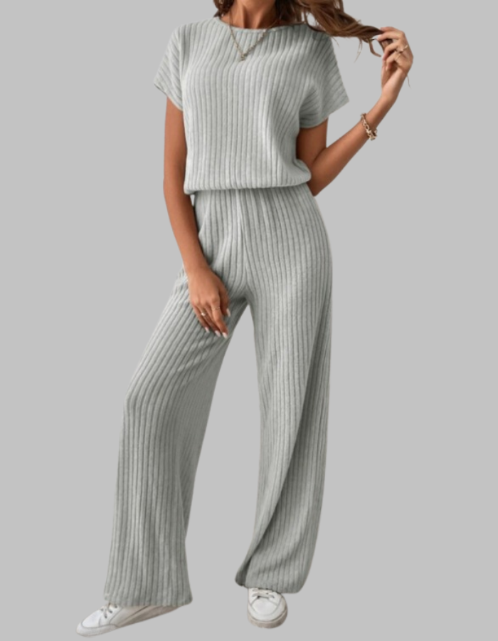 Close-up of a women's ribbed short sleeve top, part of a comfortable two-piece set with wide-leg pants.