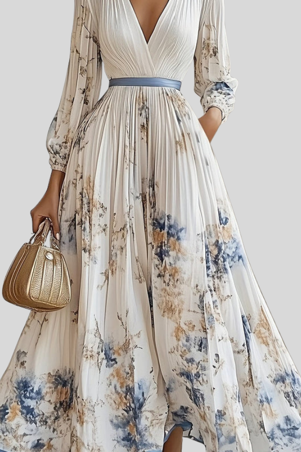 Elegant women's flowy bohemian midi dress, pleated and romantic, ideal for summer parties or casual wear.