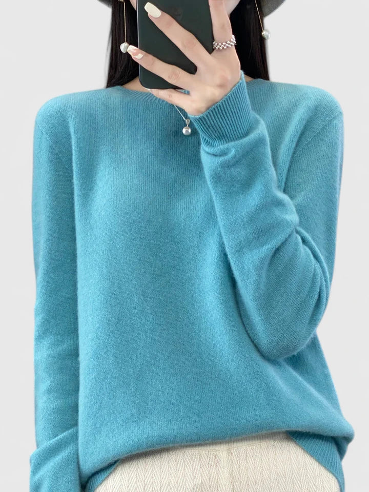 Essential women's crewneck pullover, comfortable knit sweater for layering versatility.
