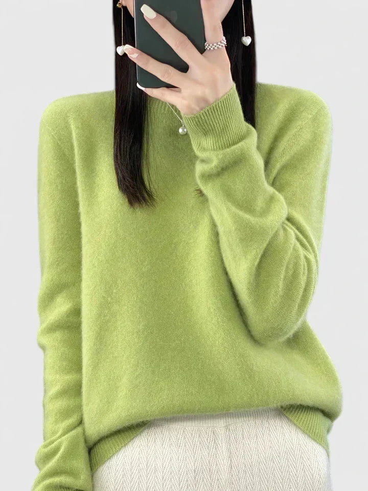 Durable women's crewneck sweater, comfortable knit pullover for long-lasting wear.