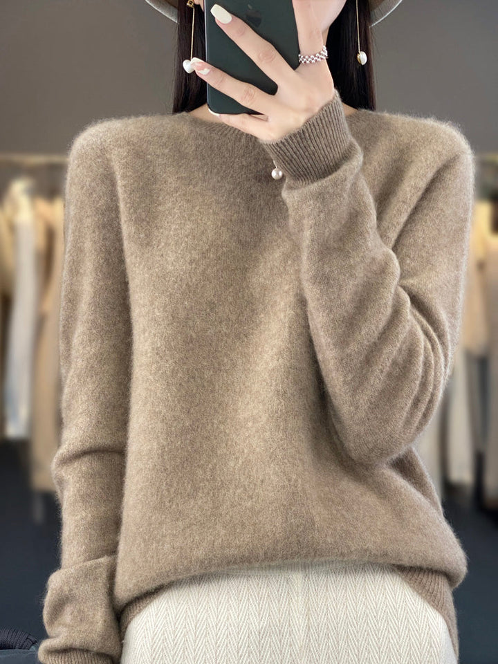 Stylish women's round neck knit sweater, relaxed fit pullover for casual comfort.