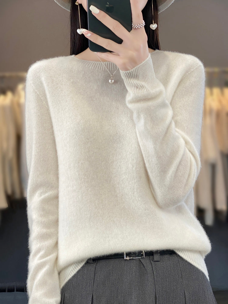 Versatile women's pullover sweater, a cozy crewneck knit for all-day comfort & style.